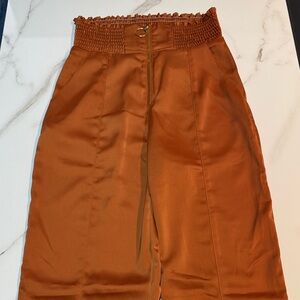 Runaway Rust Orange Smocked Waist Pants
Size XS